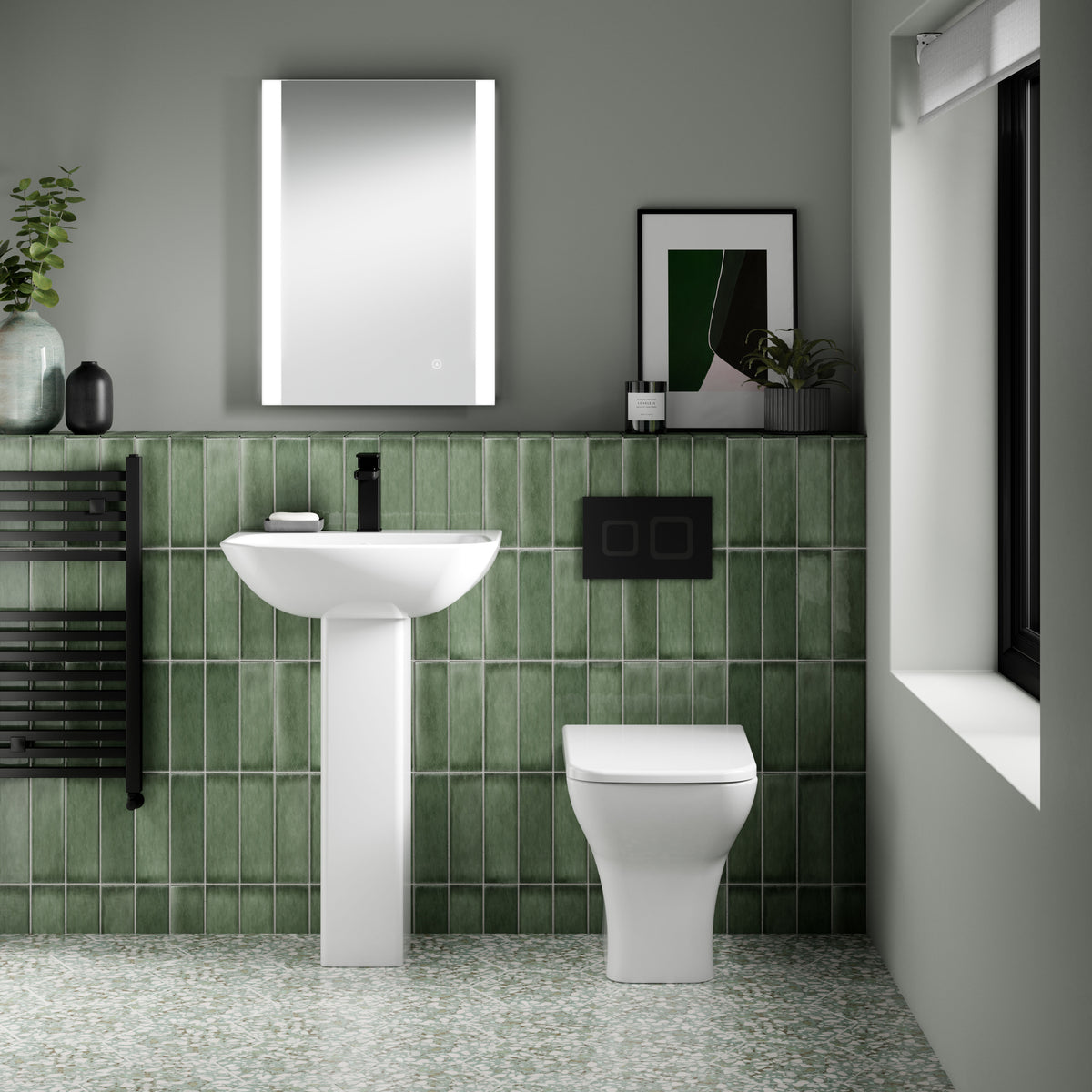 nuie Ava Round Back to Wall Toilet Pan With Seat - Lifestyle image